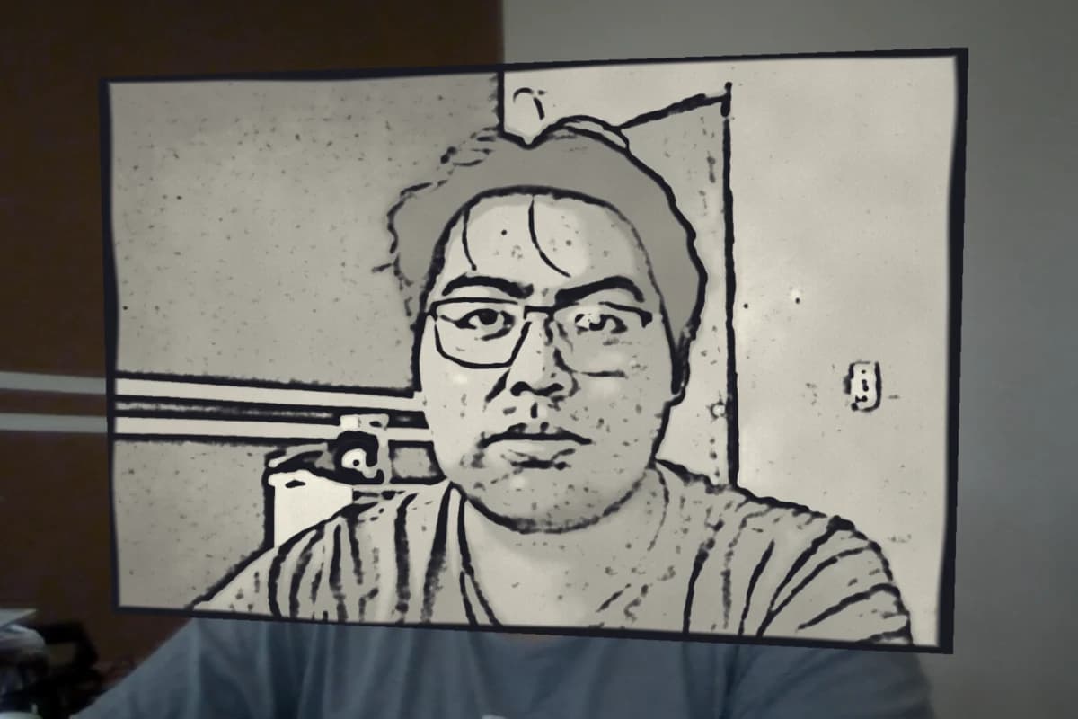 The Rotoscoping portal: a pencil-drawn, cross-hatched scene inside the frame, the real room outside it